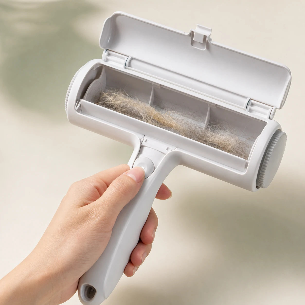Open self-cleaning chamber with collected pet hair